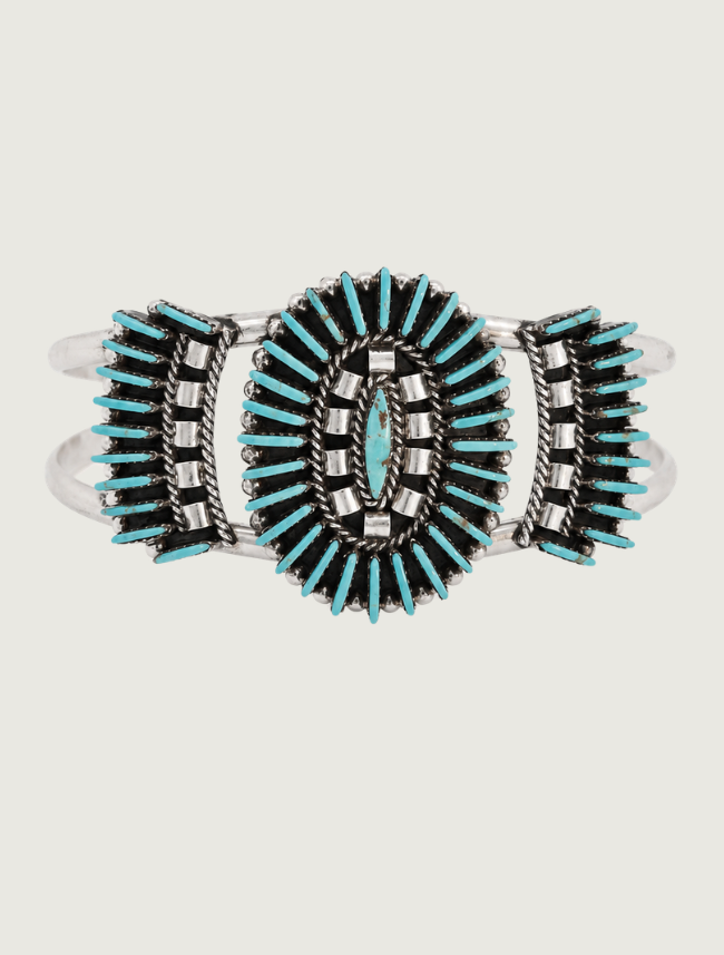 Front view of Edmund Cooeyate sterling silver Kingman turquoise needlepoint cluster cuff
