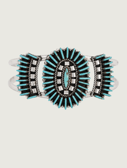 Front view of Edmund Cooeyate sterling silver Kingman turquoise needlepoint cluster cuff