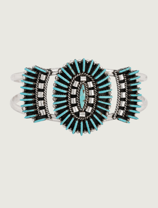 Front view of Edmund Cooeyate sterling silver Kingman turquoise needlepoint cluster cuff