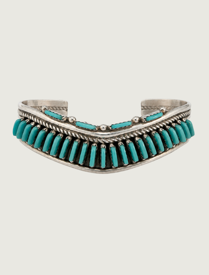 Sterling silver cuff bracelet with Sleeping Beauty turquoise needlepoint stones, front view