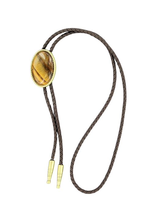 Bolo tie with a tiger's eye stone and gold accents on a white background