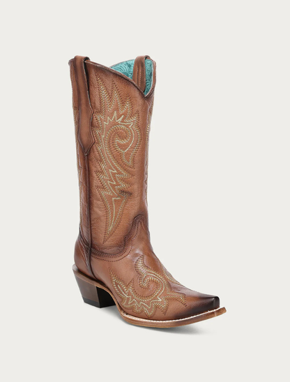 Brown cowboy boot with intricate embroidery on a white background